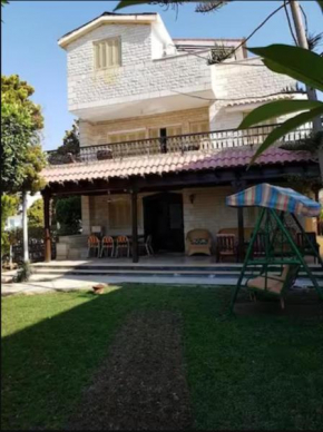 Adorable 2 Bedroom chalet with Garden in North Coast - Badr Resort